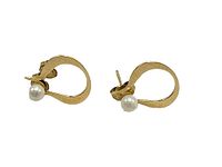 Pair of vintage 10K yellow gold earrings with single pearls on each, viewed from front.