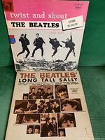 Front covers of Beatles Twist and Shout and Long Tall Sally LP albums showing original album artwork and titles.