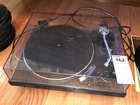 Front view of Technics SL-1900 turntable with closed dust cover showing overall condition