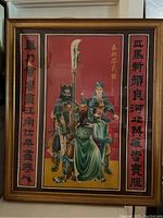 Full framed large Chinese painting showing three intricately painted warriors with calligraphy on a red background.