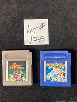 Top view of Pokémon Blue and Mighty Morphin Power Rangers GameBoy cartridges showing front labels.