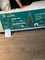 Picture of the tree box showing General Electric branding and model information including 7 ft height and 550 lights.