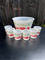 Full set of the white punch bowl and six matching cups with Christmas themed 'Tom and Jerry' green and red graphics