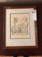 Framed and matted pen and ink drawing of Grant Hall at Queens University, signed, shown straight on with visible tag and details.