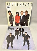 Front covers of two Pretenders vinyl record albums, showing band members in different poses and outfits.