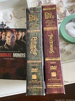 Spine view of two Lord of the Rings Special Extended DVD editions showing The Fellowship of the Ring and The Two Towers.