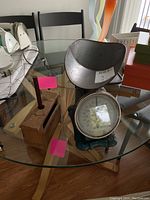 Photo showing both the wood butter mold and Pelouze weigh scale on a glass table.