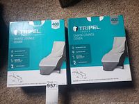 Photo showing two boxes of Tripel chaise lounge covers with dimensions and features labeled