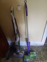 Vacuum and cleaning tools including Bissell CrossWave, Swiffer sweeper with cleaning pads