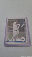 Photo of Fernando Tatis Jr. 2021 Topps rookie card in protective sleeve