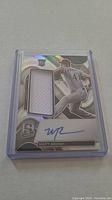 Matt Brash rookie baseball card with jersey patch and autograph in plastic holder.