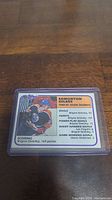 Photo showing Wayne Gretzky hockey trading card with stats on 1980-81 Edmonton Oilers season.