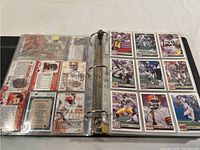 Binder pages displaying Pro Set base football cards featuring teams such as Pittsburgh Steelers, Minnesota Vikings, Cleveland Browns and San Francisco 49ers