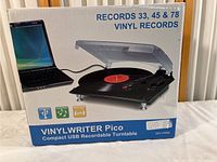 Box of Vinylwriter Pico recordable turntable showing compatibility with 33, 45, 78 RPM vinyl records and USB connection.