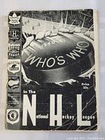 Front cover of 1940-41 NHL Hockey Guide featuring large text "Who's Who in the NHL" with a hockey rink illustration and NHL team logos.