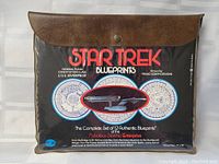 Front of folder showing Star Trek Blueprints cover with U.S.S. Enterprise image and title text
