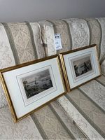 Pair of 6x8 framed prints with gold frames and white matting placed on patterned couch; lot includes two prints titled 'Scene in the Bay of Quinte' and 'Hallowell'