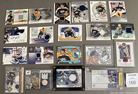 Full overview of 20 Nashville Predators insert cards with game used fabric and autographs.