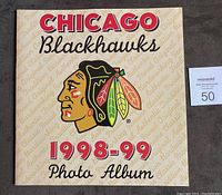 Front cover of the oversized 1998-99 Chicago Blackhawks photo album with team logo and title