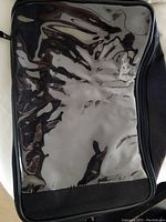 Front view of the motorcycle tank bag showing transparent top area for maps or devices.