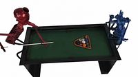 Angled side view of unique handcrafted metal skeleton pool players at green felt mini pool table with pool balls and cues.