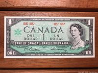 Front side of the 1967 Canadian Centennial $1 bill showing details and condition.