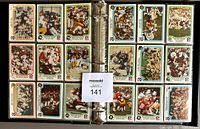 Two pages of football cards inserted in plastic binder sheets showing action shots of players from multiple NFL teams from 1979 season.