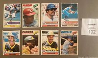 Fronts of chosen cards showing player images and team details including Johnny Bench, George Brett, Dave Winfield and others