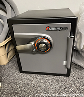 Front view showing combination dial, handle, logo and overall condition