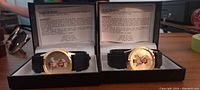 Both Campbell's Soup Company vintage watches shown in their original boxes with warranty cards and chronometer info.
