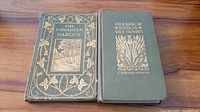 Two hardcover vintage books displayed side by side on wooden surface, titles visible: The Canadian Garden and Field Book of American Wild Flowers.
