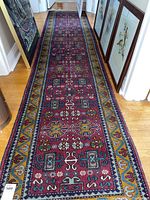 Full-length view of the runner laid down a hallway showing overall design and dimensions.
