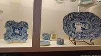 Spode shaped dish left, Mason’s cup and saucer center, triangular dishes behind, oval platter right