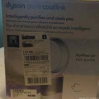 Front of box showing Dyson Pure Cool Link branding and 'Intelligently purifies and cools you' text