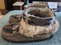 Side view of Manitobah Mukluk short boots showing grey suede, patterned fabric, and faux fur trim