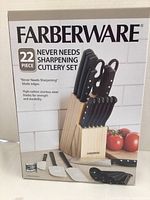 Front of Farberware 22-piece cutlery set box showing brand, product details, and image of the wooden block with knives and utensils.