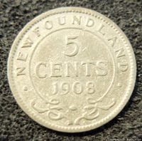 Reverse side of 1908 Newfoundland 5 cents silver coin featuring denomination and year with decorative border