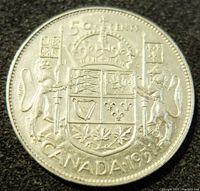 Reverse side showing the Canadian coat of arms, denomination, and year of issue.