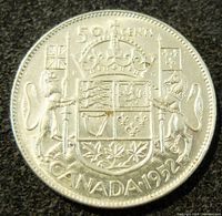 Photo of the coin's reverse showing the Canadian coat of arms, denomination, and year 1952.