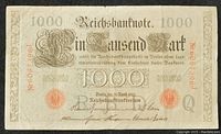 Front side of 1910 German 1000 Mark banknote showing denomination, ornate script, serial numbers, and signatures.