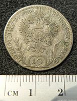 Front side of the 1789 silver Austrian 10 Kreuzer coin showing double-headed eagle emblem, denomination and inscriptions.