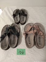 Three pairs of size 39 Mephisto sandals arranged side by side showing top view and footbeds.