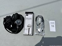 New medical equipment including a boxed single head stethoscope and sphygmomanometer cuff and gauge