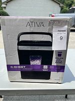 Front view of Ativa paper shredder box showing branding, capacity, and features.