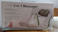 Box showing the product name, features, and an image of the 3 in 1 massager.