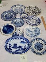 Full set of 11 blue and white collector's plates including various scenic and floral designs, plus the Dresden Mother's Day plate