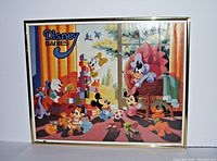 Frontal view of the Disney Babies framed print showing entire scene with metal frame and white background.