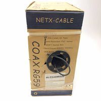 Front view of the Netx-Cable RG59/U coaxial cable box showing key specifications such as flame retardant PVC jacket, 1000 feet length, bare copper 20 AWG conductor, 1000 MHz frequency, 95% braid, with part number 4U-754599520.