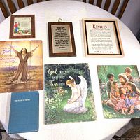 Full overhead view of all seven items displayed on wooden chairs and table with white cloth