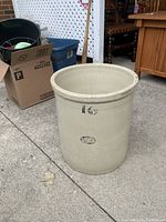 Stoneware crock showing front side with number '16' and Medalta Stoneware stamp.